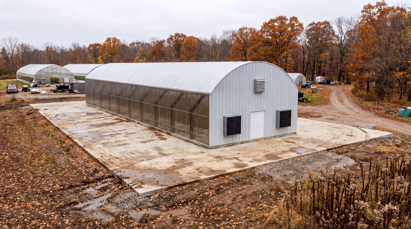 Cultivation farm greenhouse on a concrete pad